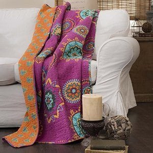 Colorful ethnic or boho prints on throws and pillows are a fun way to add a little pizzazz.