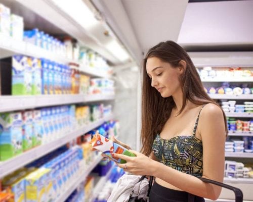 girl buying milk