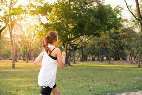 woman running jogging in park
