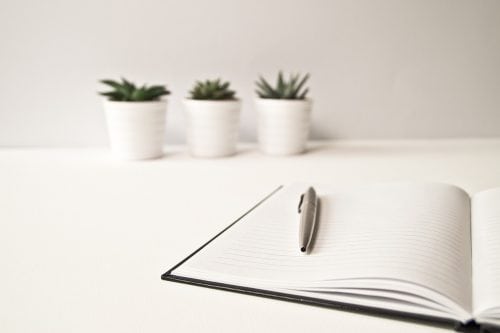 notebook open on table