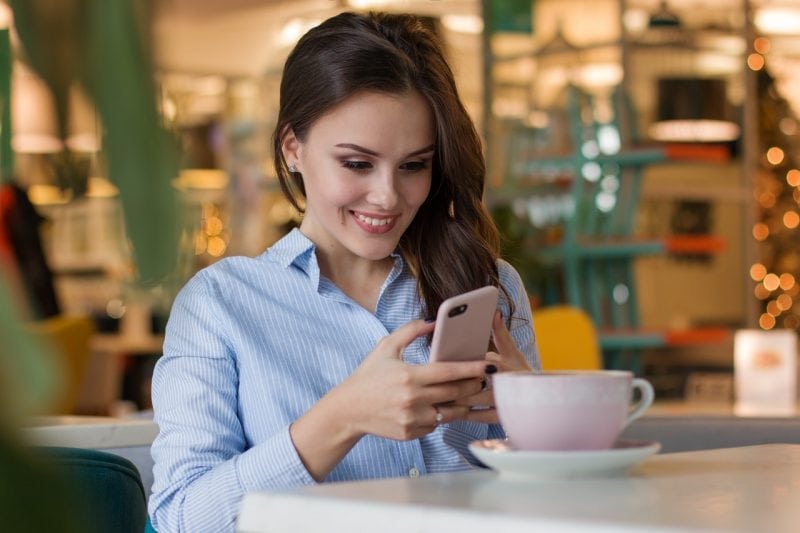 woman checking on phone