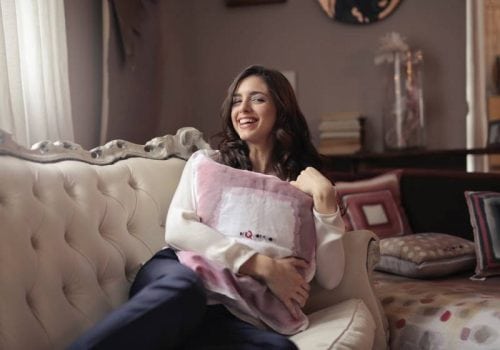 woman pillow happy smiling