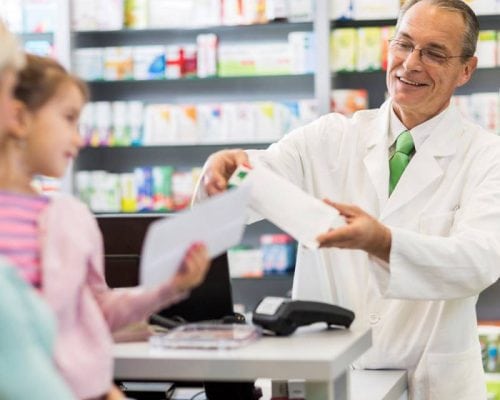 Pharmacist helping customers