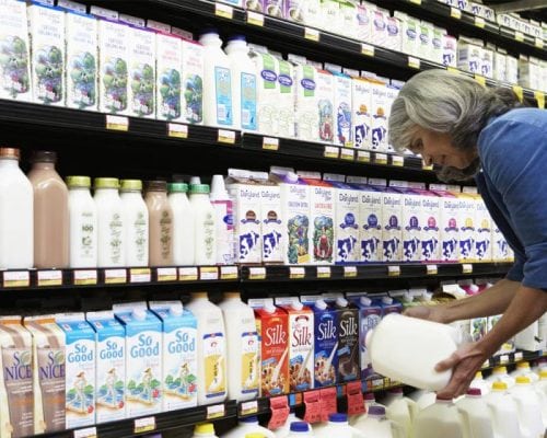 woman buying milk