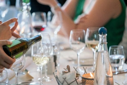 Image of a table covered in glasses