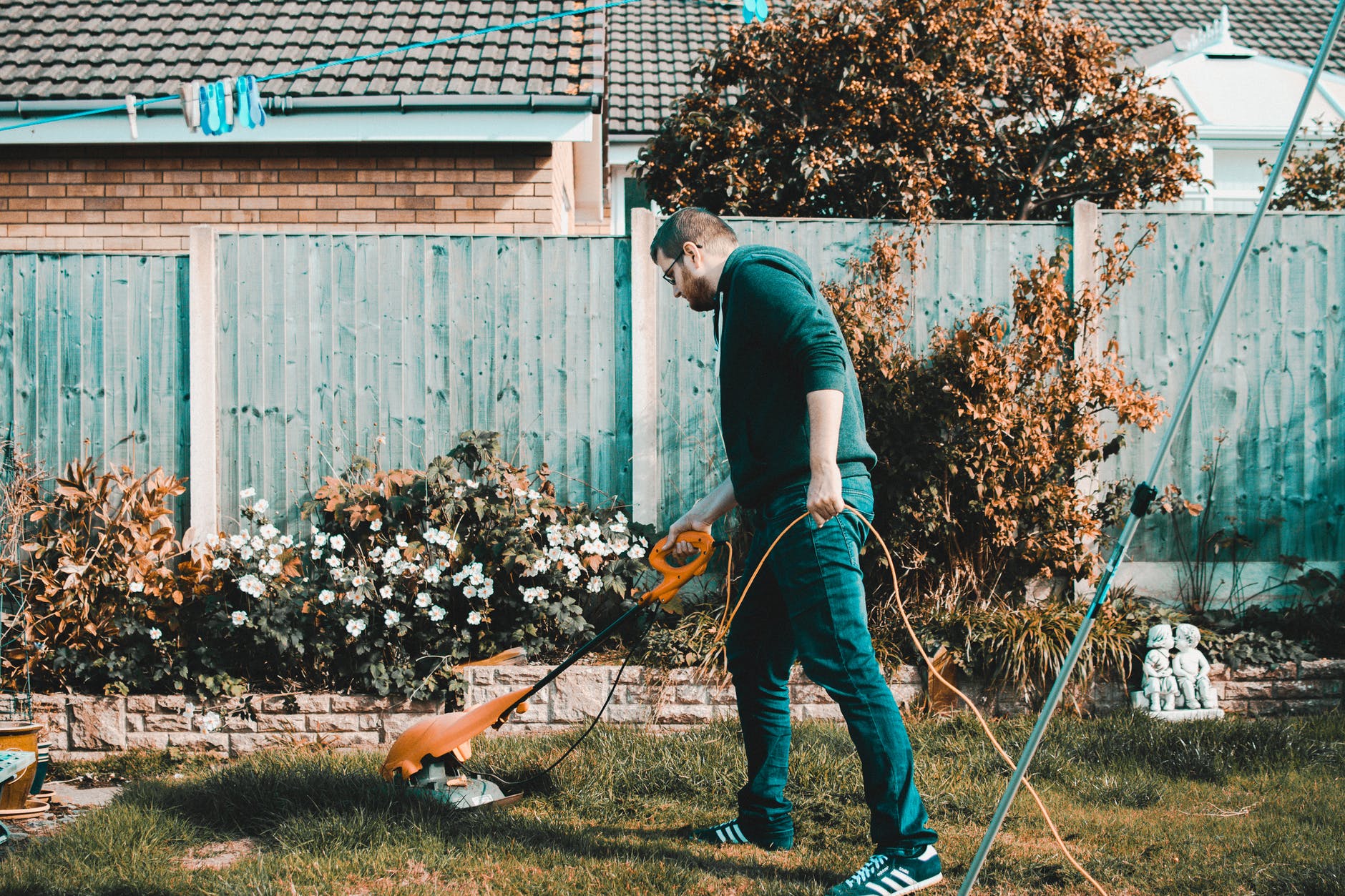 A man mowing the lawn