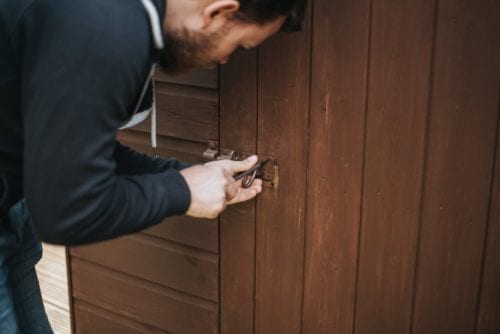 A man fixes a lock