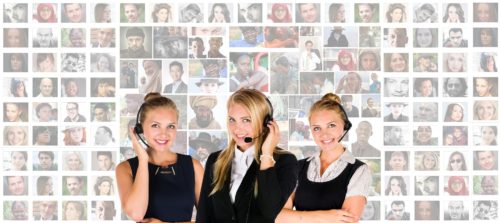 Call center workers with headsets