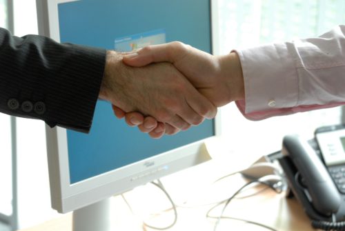 Handshake between two professionals