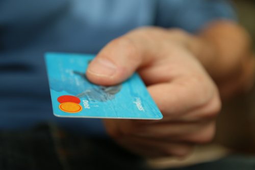 Person paying with a bank card