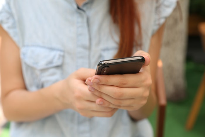 Girl checking phone