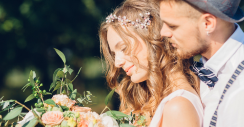 couple posing for wedding photos