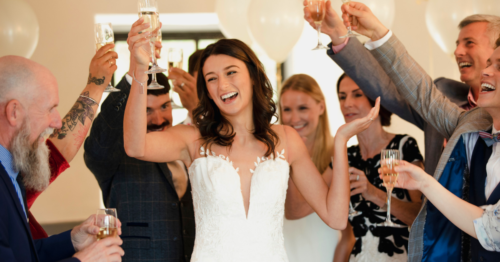 Bride surrounded by guests