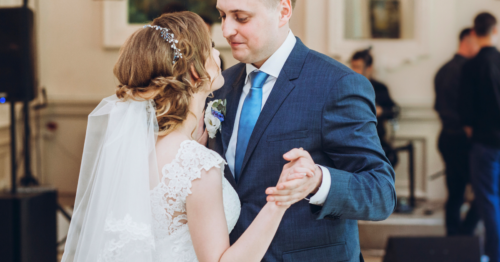 Bride and groom dancing